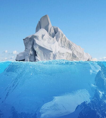 What term describes what happens when ice breaks off a main glacier and becomes an iceberg?