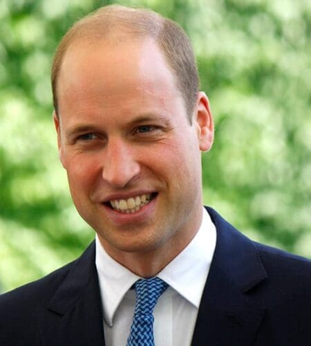 Why did Prince William have to salute his brother while they attended Sandhurst?