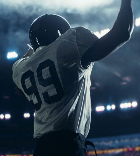 What player on a football team kicks field goals and kickoffs?