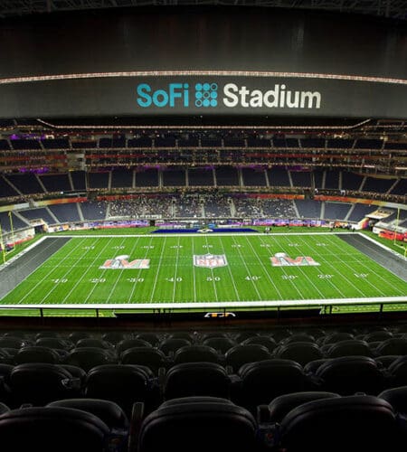 Which Denver Bronco scored on the first play from scrimmage in Super Bowl XXII?