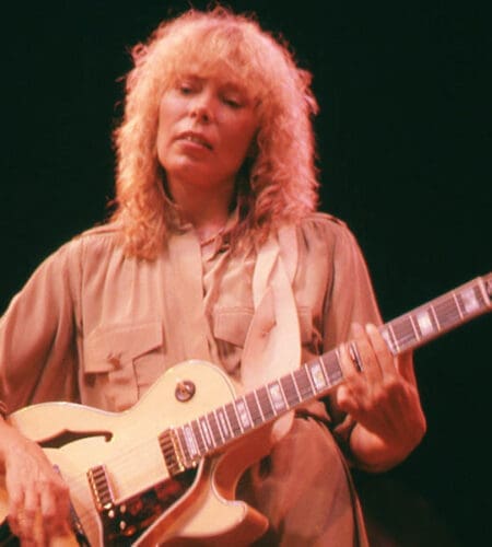 Which Bob Dylan album includes his cover of Joni Mitchell’s “Big Yellow Taxi”?