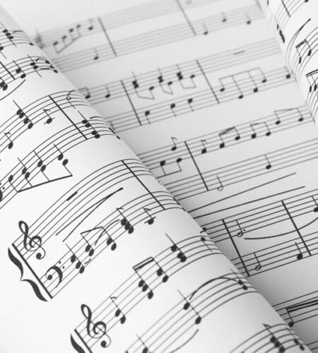 Which song features the following line: “No dark sarcasm in the classroom”?