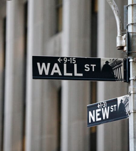 To visit the financial center on Wall Street, what city would you have to travel to?